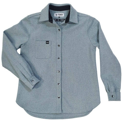 A misty blue long-sleeved women's shirt with a button-down collar, a chest pocket, and two-tone recycled polyester buttons.